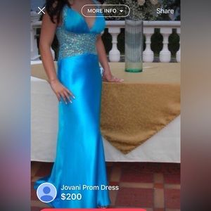 Jovani Beautiful blue dress with silver beading.